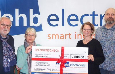 ehb electronics Scheckübergabe Löwenherz